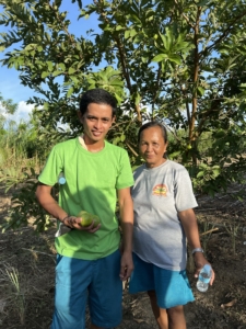 Noel, a young farmer from Leyte, with his mother at their family farm