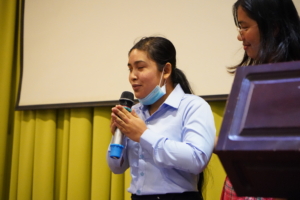 A photo of Oun Sreyda sharing her experiences of massage training during the closing event of the Anma and Shiatsu Therapeutic Massage Women with Disability, June 2022