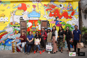 Participants during a visit to an art community in Bangkok.