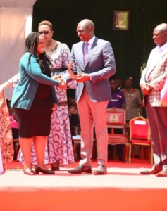Kenya’s President H.E. Hon. William Ruto awarding Anne Gloria, Executive Director of Deaf Outreach Program on her innovative contributions in Education and Sexual Reproductive Health