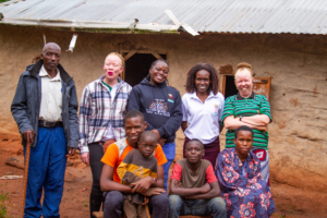 Photo credit - Albinism Umbrella - Agnes (right, standing) during the Learn Visit in November 2023